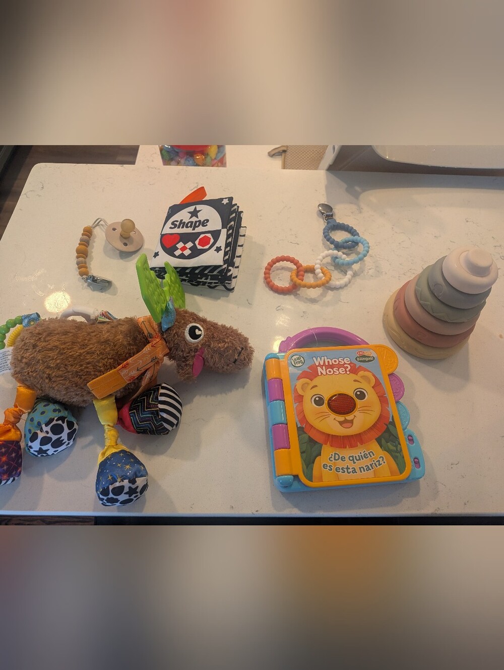 6-12 Months Baby Toy Bundle - Sensory Toys, Button book, Lamaze Moose Bibs paci